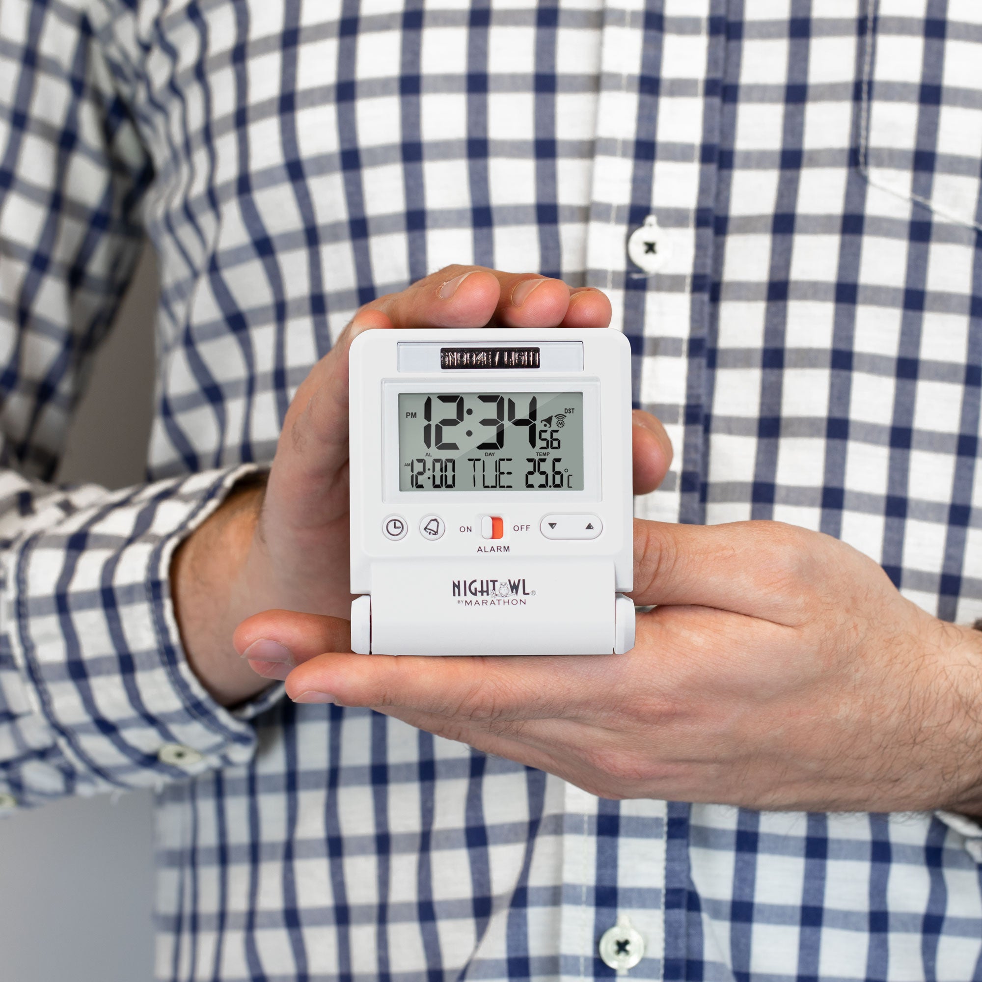 Self-Setting Travel Alarm Clock