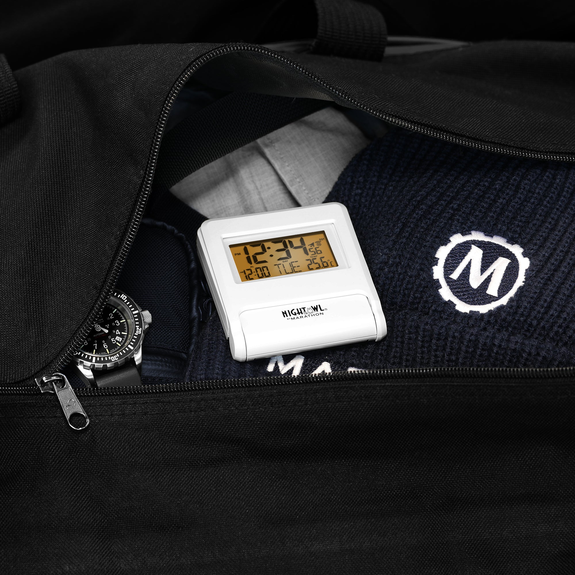 Self-Setting Travel Alarm Clock