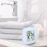 Reloj despertador compacto con temperatura y fecha image